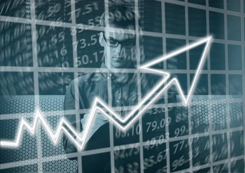 Man behind rising graphic