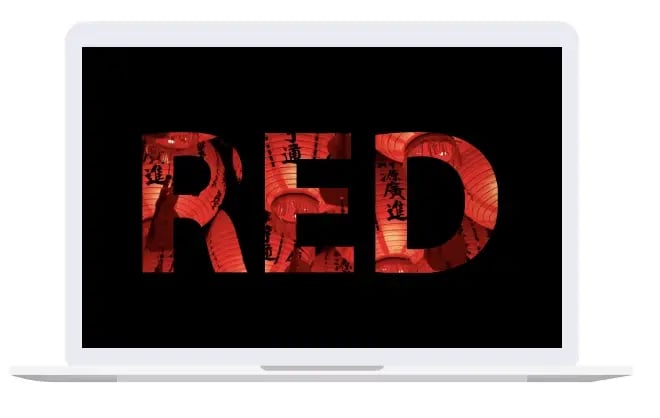 A computer with red text