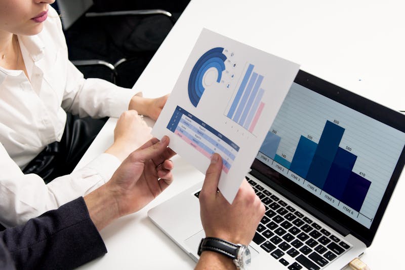 people holding graphs
