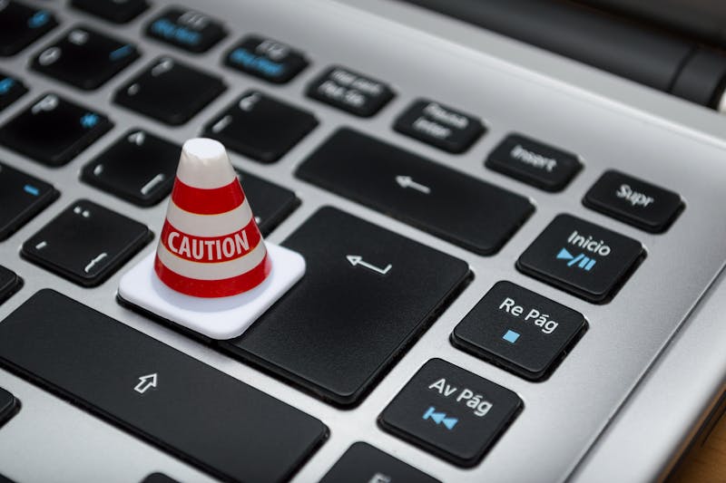 caution sign on laptop