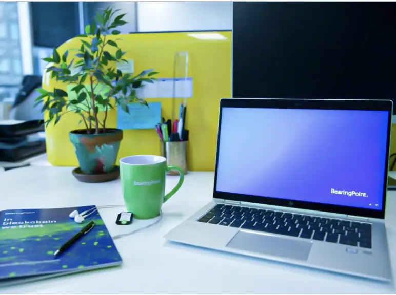 Laptop and documents BearingPoint